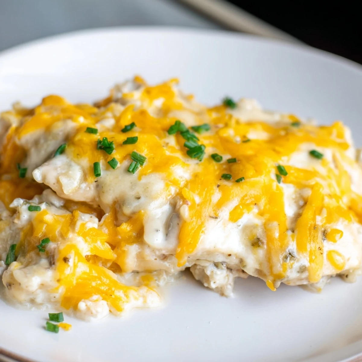 Savory Cheddar Ranch Chicken Bake with creamy ranch sauce and juicy chicken breasts.