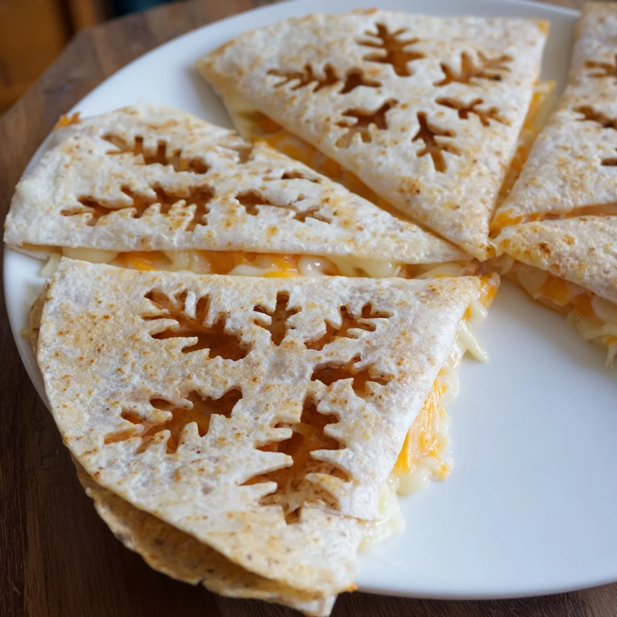 Homemade Express Snowflake Quesadillas: warm, flavorful Mexican-inspired snack bursting with cheese and fun.