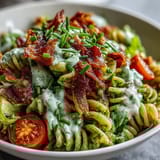Creamy BLT Pasta with Avocado Ranch, featuring tender pasta, smoky bacon, and crisp lettuce in a zesty ranch-avocado blend.  