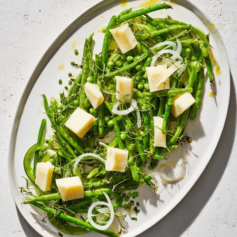 This image displays a beautiful English Ivy salad, showcasing colorful vegetables, and creamy white cheddar cheese.