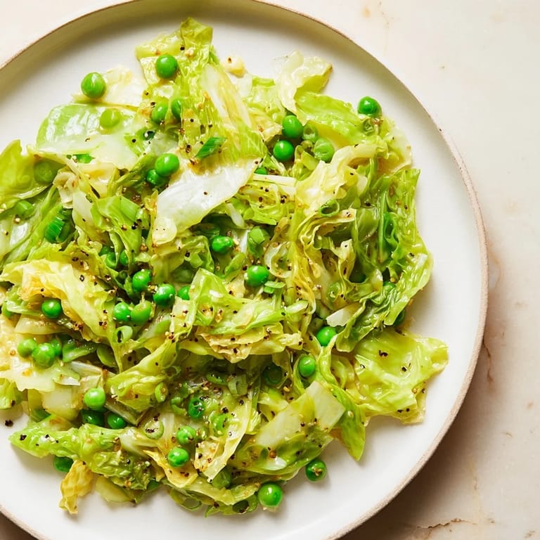 Close-up of a flavorful Cabbage Stir-Fry, highlighting the tender-crisp texture and savory garlic aroma.